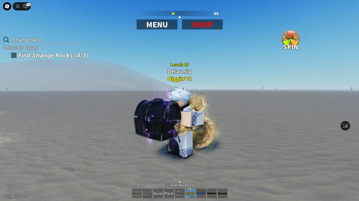 Player carrying a cursed chest in Desert Detectors